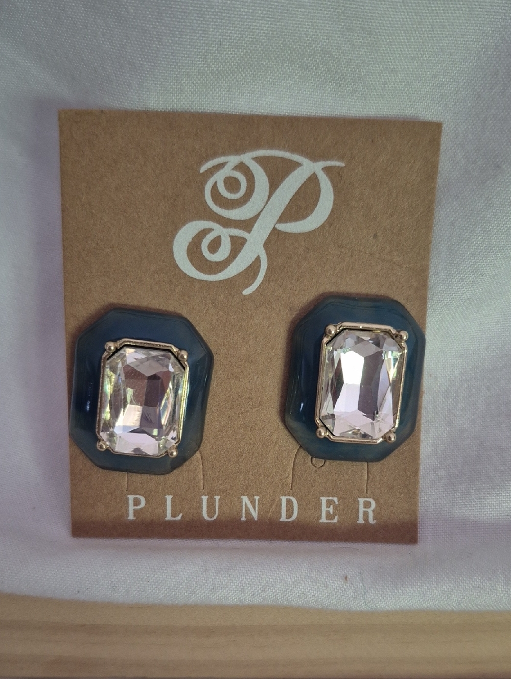 Plunder Clear Crystal Studs on Deep Teal Resin Bases